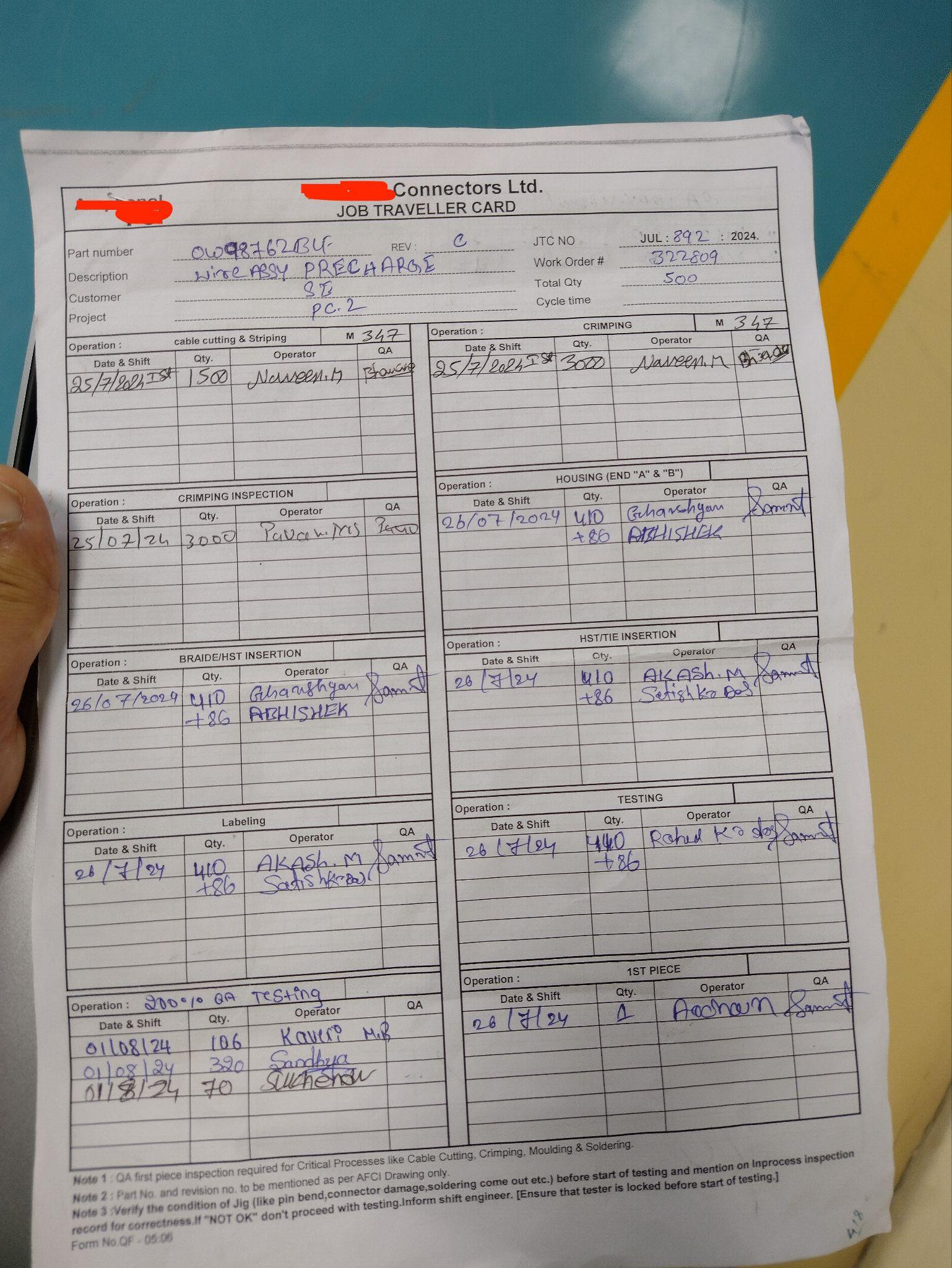 A handwritten paper job traveller card used to track manufacturing operations